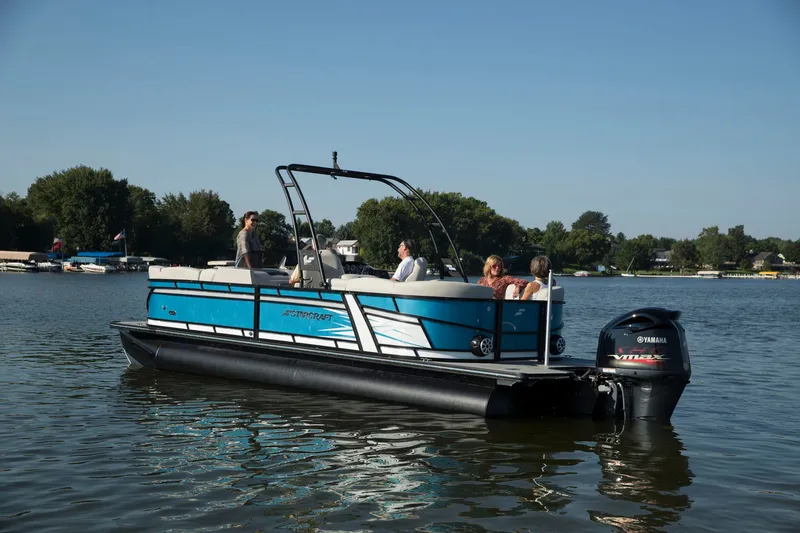 The Image of Starcraft SLS 3 DL 2026 pontoon boat displayed at a show. - 0