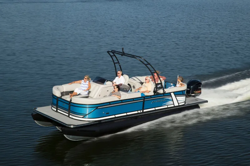 Slide: The Image of Starcraft SLS 3 DL 2026 pontoon boat displayed at a trade show. - 1