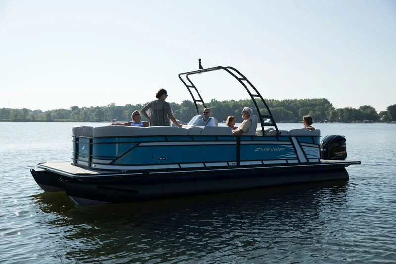 Slide: The Image of 2026 Starcraft SLS 3 DL pontoon boat with luxurious interior. - 2