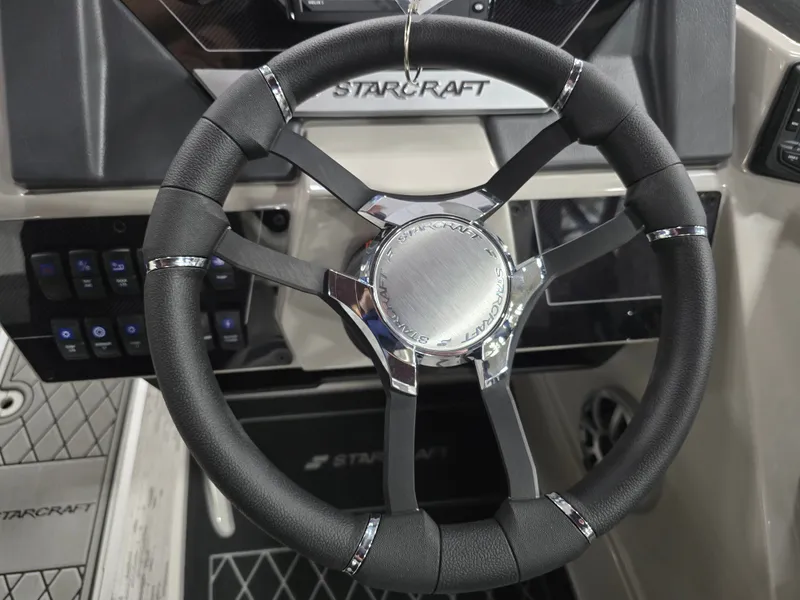 Slide: The Image of Steering wheel of the 2026 Starcraft SLS 3 DL boat. - 22