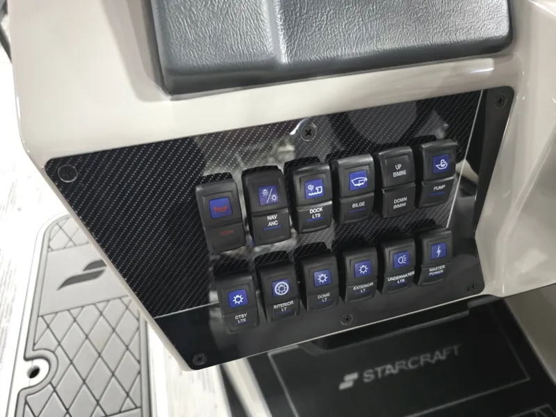 Slide: The Image of Control panel of 2026 Starcraft SLS 3 DL with various switches. - 24