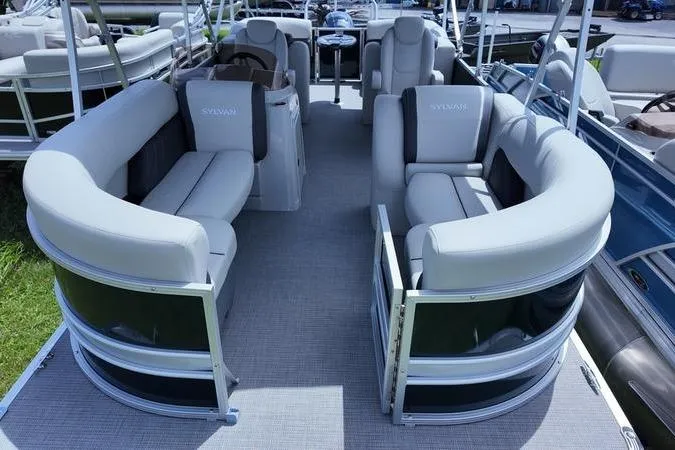 Slide: The Image of 2025 Sylvan Mirage 822 LZ pontoon boat with spacious seating and modern design. - 2