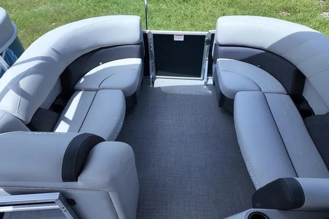 Slide: The Image of 2025 Sylvan Mirage 822 LZ pontoon boat interior with spacious seating and modern design. - 9
