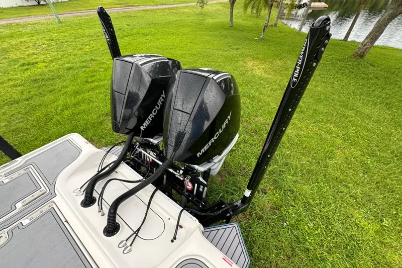 Slide: The Image of 2023 Tidewater 2700 Carolina Bay with dual Mercury engines and Power-Pole anchors. - 11