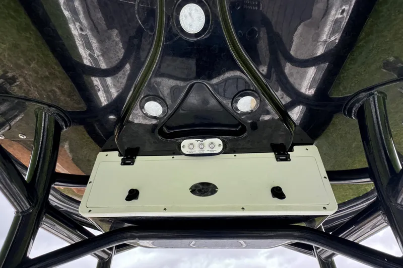 Slide: The Image of Tidewater 2700 Carolina Bay 2023 boat console with overhead view and control panel. - 17