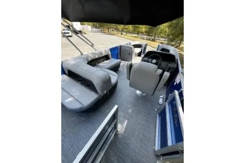 Slide: The Image of 2026 Sun Tracker Party Barge 18 DLX interior with spacious seating and modern design. - 4