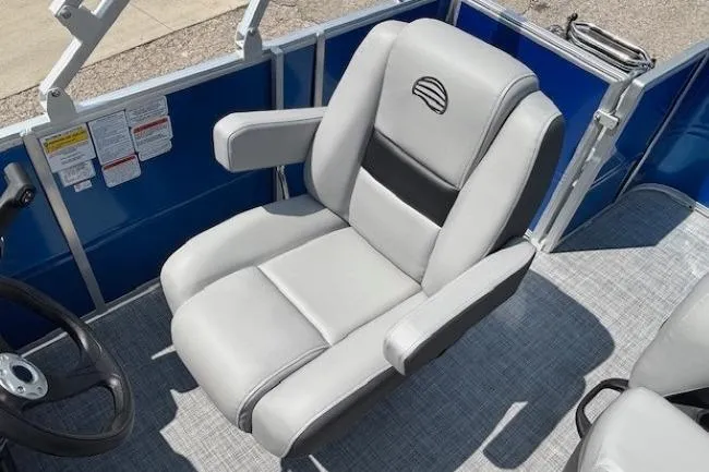 Slide: The Image of Captain's chair on 2026 Sun Tracker Party Barge 18 DLX pontoon boat, featuring gray upholstery. - 17