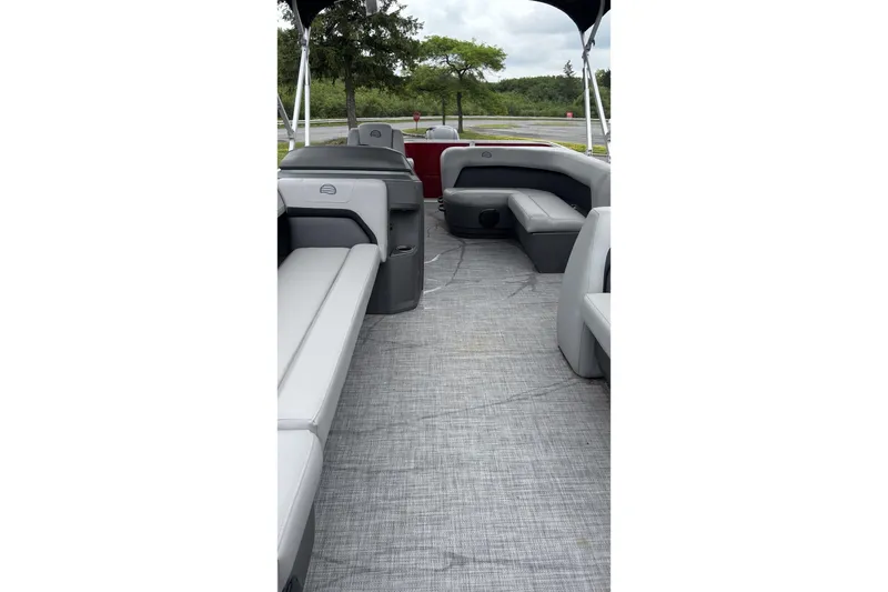 Slide: The Image of 2026 Sun Tracker Party Barge 18 DLX interior with spacious seating and modern design. - 1
