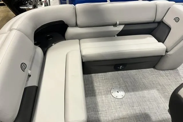 Slide: The Image of 2026 Sun Tracker Party Barge 20 DLX interior with gray seating and modern design. - 9