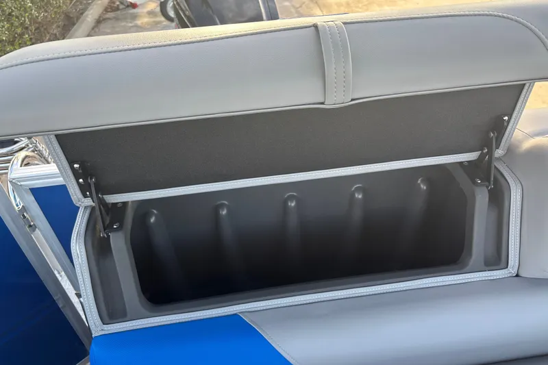 Slide: The Image of Open storage compartment on 2026 Sun Tracker Party Barge 20 DLX boat seat. - 22