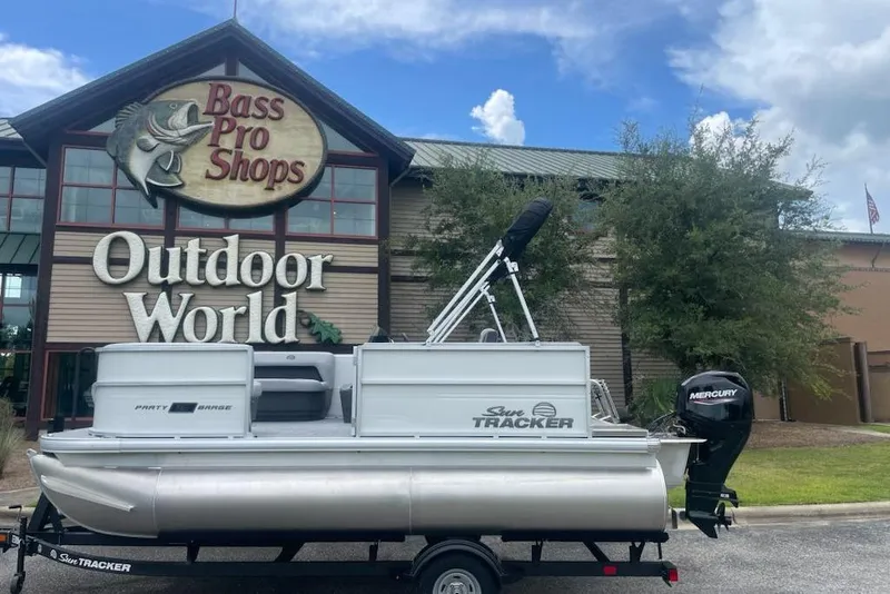 Slide: The Image of 2026 Sun Tracker Party Barge 16 DLX pontoon boat at Bass Pro Shops Outdoor World. - 5