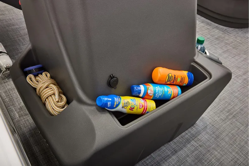 Slide: The Image of 2026 Sun Tracker Party Barge 16 DLX interior with battery compartment and seating. - 18