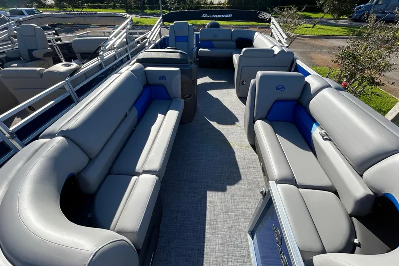 Slide: The Image of 2026 Sun Tracker Party Barge 20 DLX with spacious seating and modern design. - 3