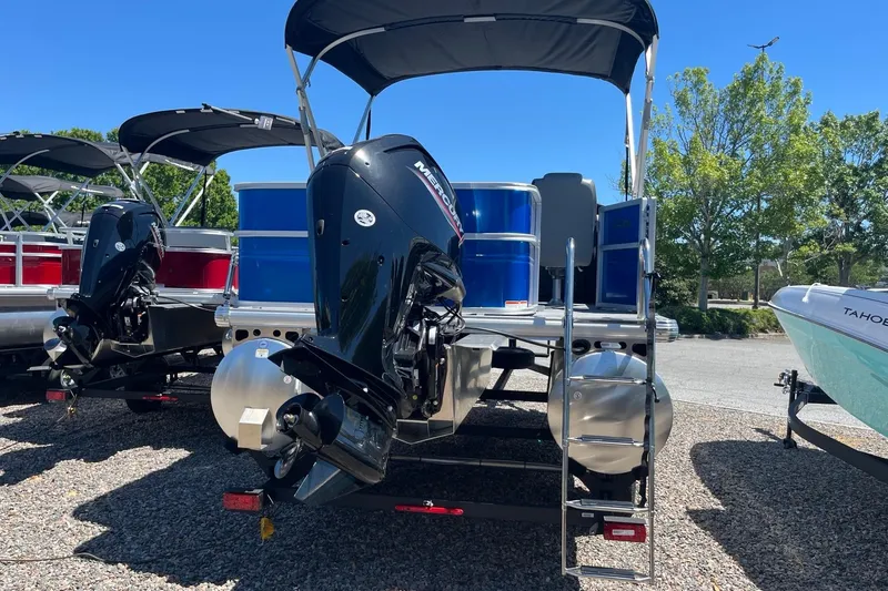 Slide: The Image of 2026 Sun Tracker Party Barge 18 DLX pontoon boat with Mercury outboard motor. - 3