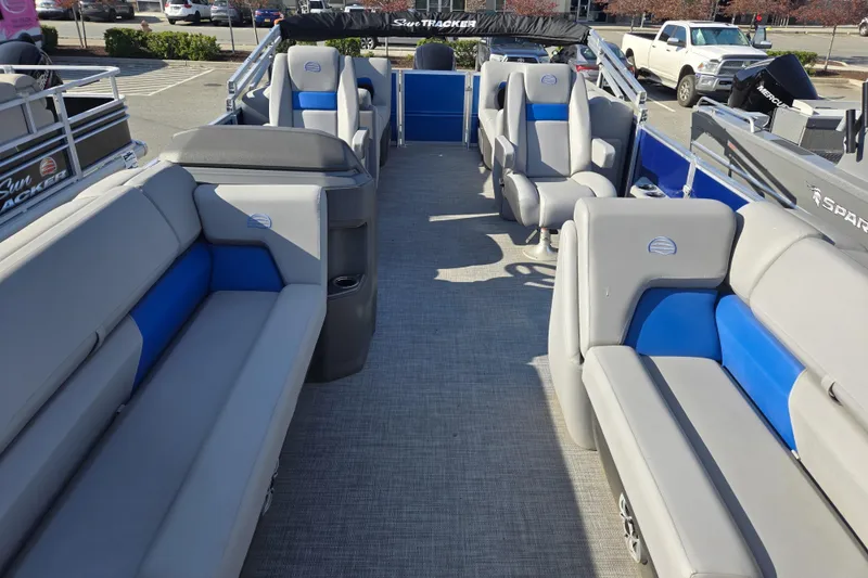 Slide: The Image of 2026 Sun Tracker Party Barge 22 DLX interior with spacious seating and modern design. - 9