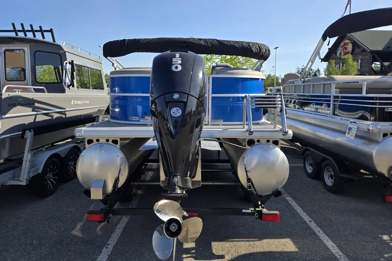 Slide: The Image of 2026 Sun Tracker Party Barge 22 DLX pontoon boat with powerful outboard motor. - 7