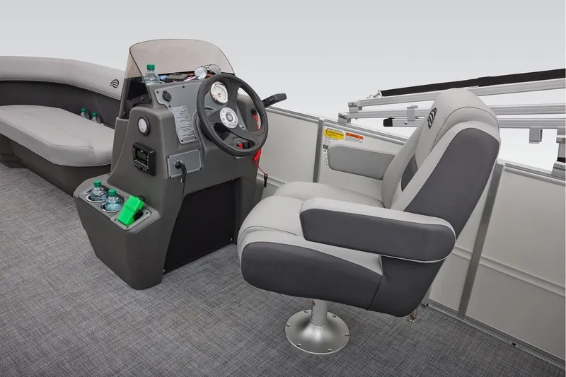 Slide: The Image of 2026 Sun Tracker Party Barge 16 DLX seating with cup holders and storage compartment. - 17