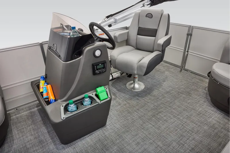 Slide: The Image of 2026 Sun Tracker Party Barge 16 DLX interior seating and storage compartments. - 16