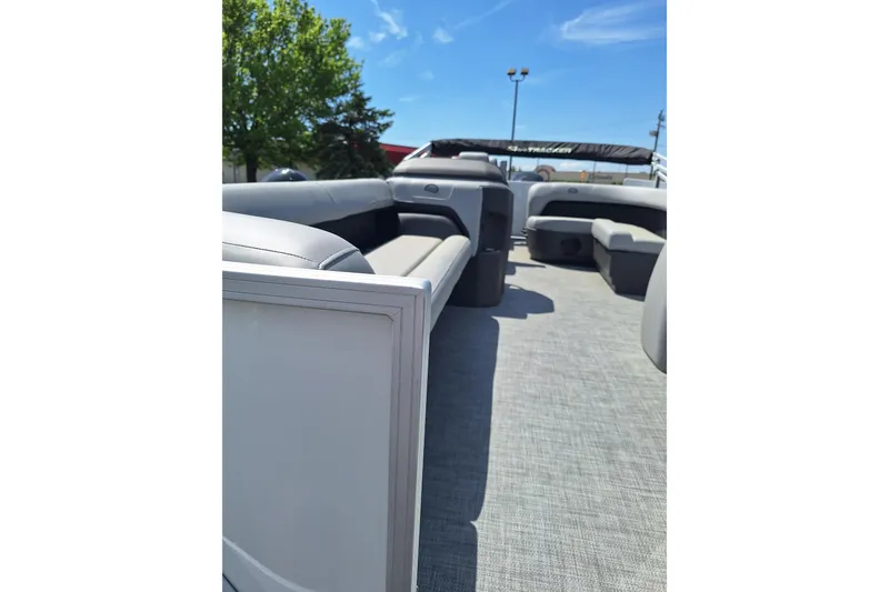 Slide: The Image of 2026 Sun Tracker Party Barge 18 DLX interior with spacious seating and modern design. - 4