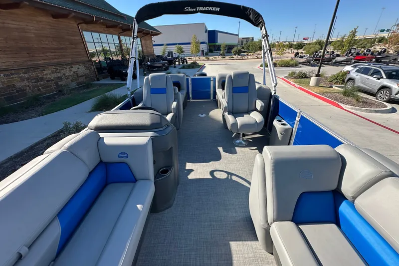 Slide: The Image of 2026 Sun Tracker Party Barge 22 DLX pontoon boat with spacious seating and modern design. - 40