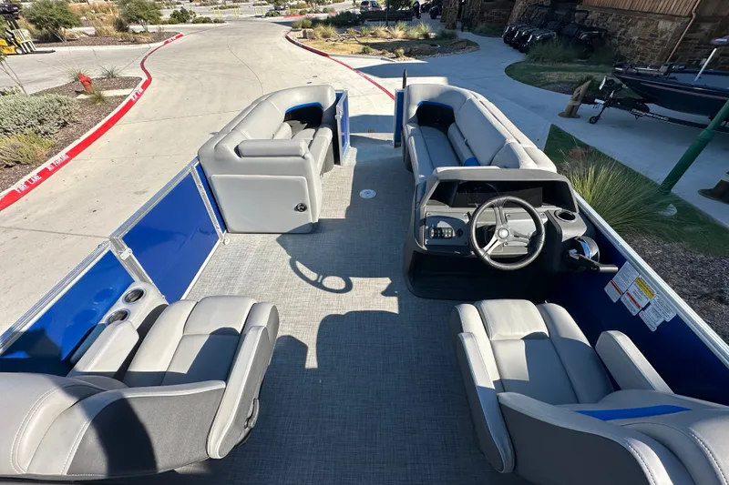 Slide: The Image of 2026 Sun Tracker Party Barge 22 DLX pontoon boat with spacious seating and modern helm. - 47