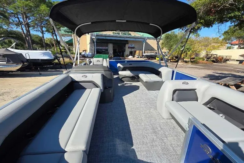 Slide: The Image of 2026 Sun Tracker Party Barge 20 DLX pontoon boat with spacious seating and canopy. - 7