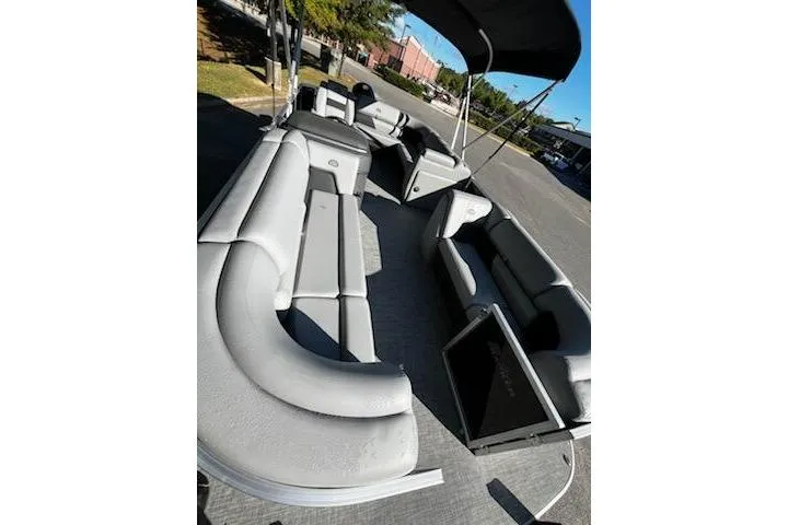 Slide: The Image of 2026 Sun Tracker Party Barge 20 DLX pontoon boat with spacious seating and canopy. - 4