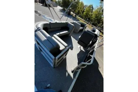 Slide: The Image of 2026 Sun Tracker Party Barge 20 DLX pontoon boat with spacious seating and modern design. - 6