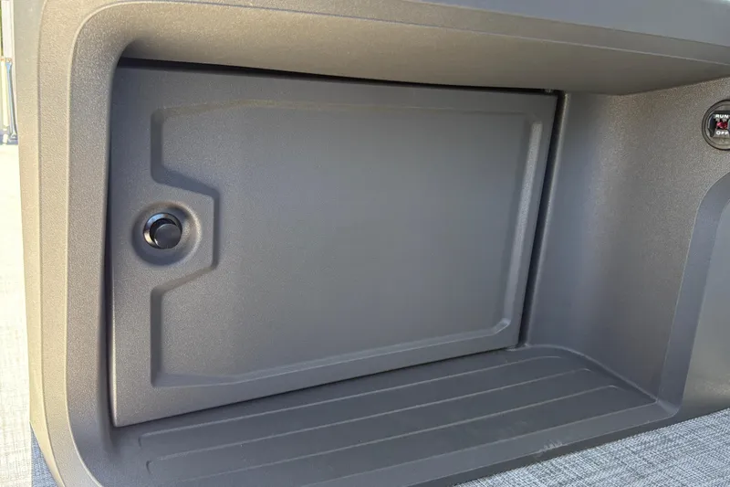 Slide: The Image of Storage compartment on 2026 Sun Tracker Party Barge 18 DLX pontoon boat. - 24