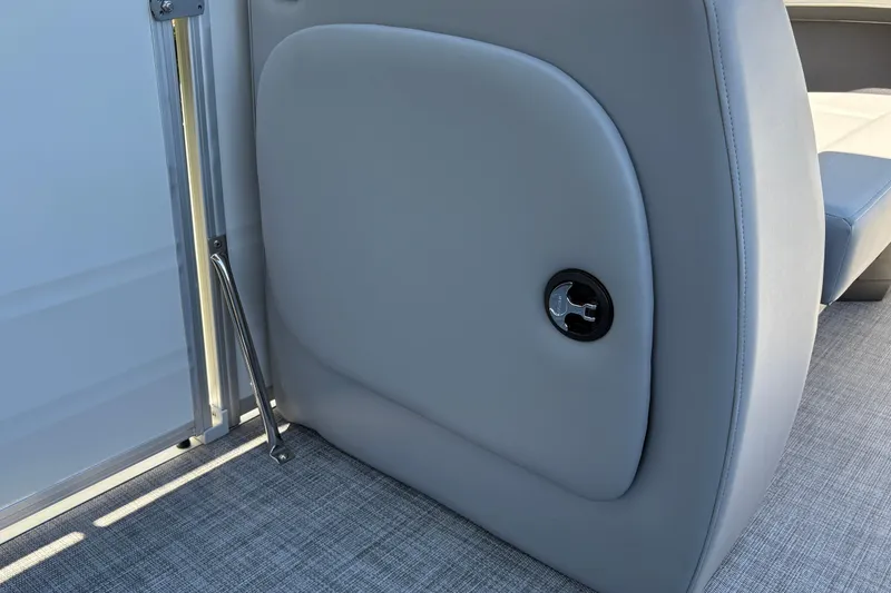 Slide: The Image of 2026 Sun Tracker Party Barge 18 DLX interior detail with sleek gray upholstery. - 34