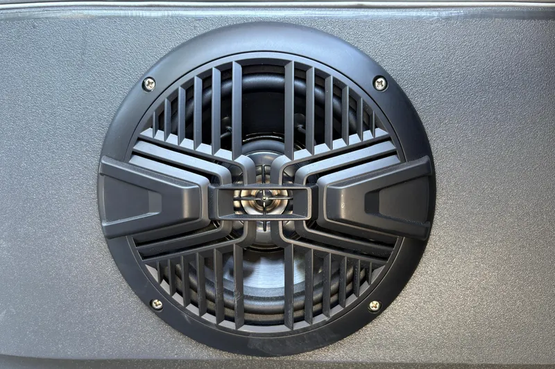 Slide: The Image of Close-up of a speaker on a 2026 Sun Tracker Party Barge 18 DLX. - 28