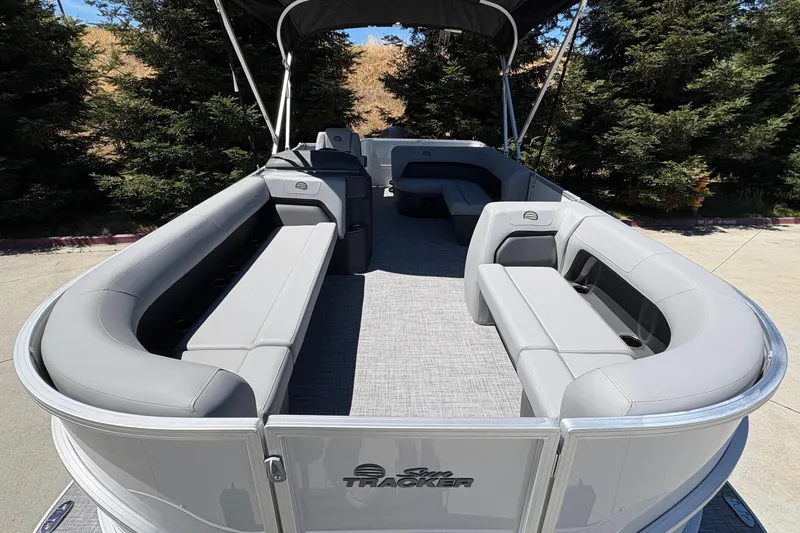 Slide: The Image of 2026 Sun Tracker Party Barge 18 DLX pontoon boat with spacious seating and canopy. - 13