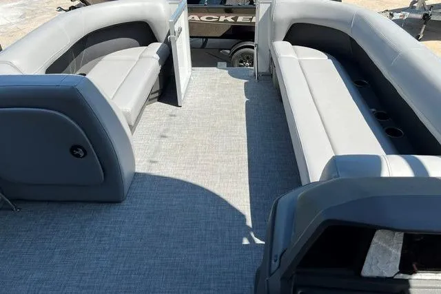 Slide: The Image of 2026 Sun Tracker Party Barge 18 DLX interior with spacious seating and modern design. - 7