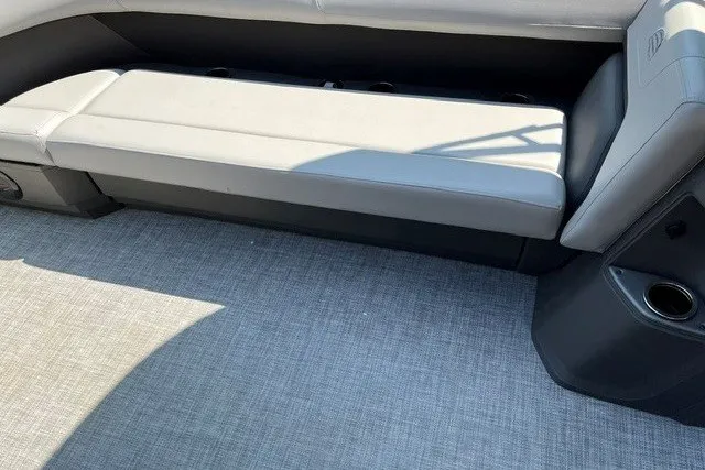 Slide: The Image of Interior seating of 2026 Sun Tracker Party Barge 18 DLX with gray upholstery. - 13