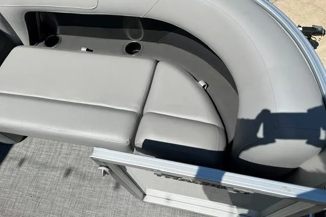 Slide: The Image of 2026 Sun Tracker Party Barge 18 DLX, gray seating with cup holders, top view. - 8