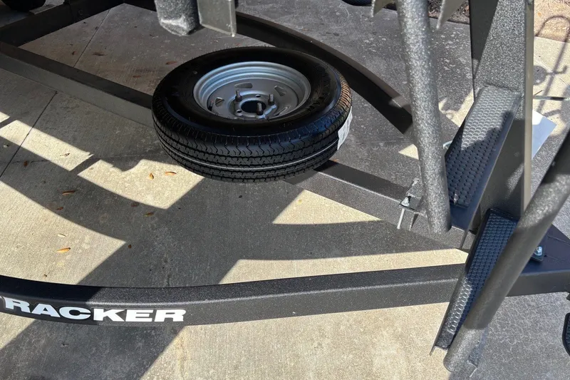 Slide: The Image of Trailer with spare tire for 2026 Sun Tracker Party Barge 16 DLX. - 9