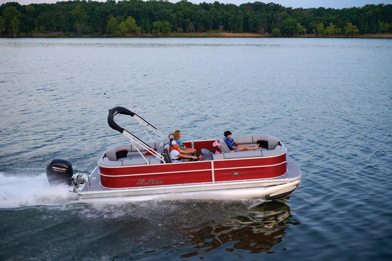 Slide: The Image of 2026 Sun Tracker Party Barge 22 DLX pontoon boat outside dealership. - 3