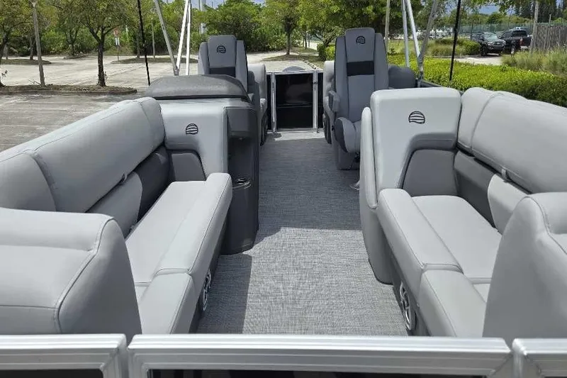 Slide: The Image of 2026 Sun Tracker Party Barge 22 DLX with spacious seating and modern design. - 3