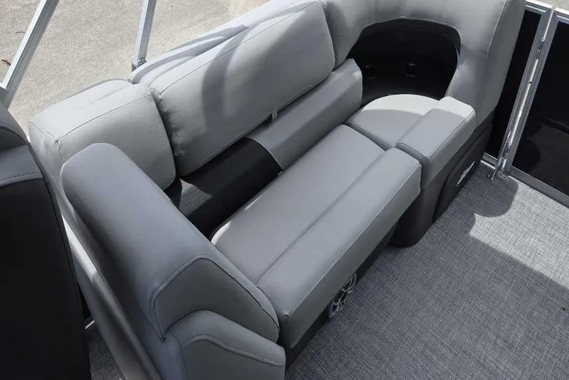 Slide: The Image of 2026 Sun Tracker Party Barge 22 DLX interior with gray cushioned seating. - 5