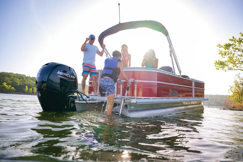 Slide: The Image of 2026 Sun Tracker Party Barge 22 DLX, gray and blue seating, spacious and comfortable design. - 20