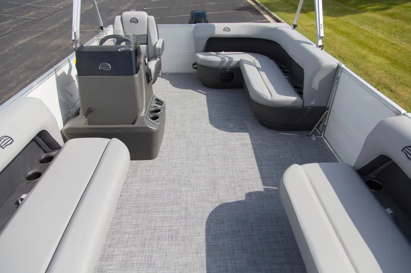 Slide: The Image of 2026 Sun Tracker Party Barge 16 DLX interior with spacious seating and modern design. - 2