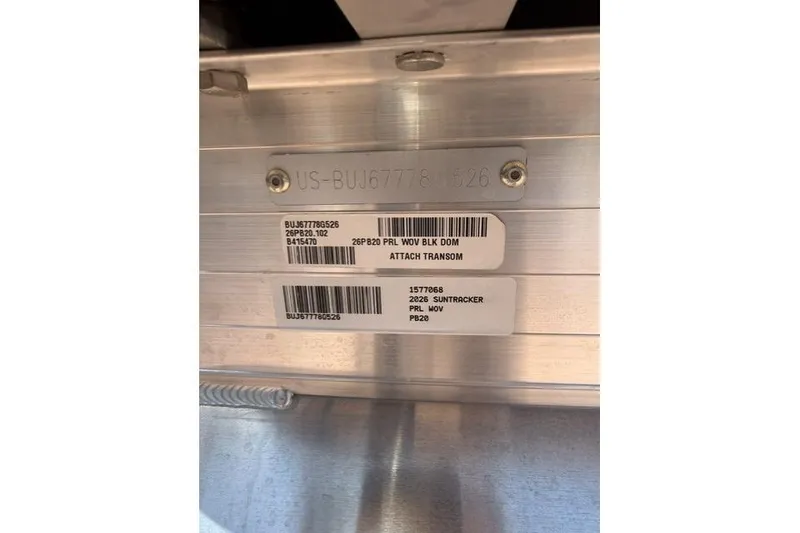 Slide: The Image of 2026 Sun Tracker Party Barge 20 DLX identification plate with serial numbers and labels. - 9