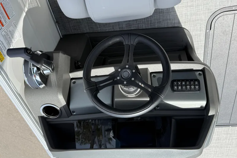 Slide: The Image of Steering console of 2026 Sun Tracker Party Barge 22 XP3 pontoon boat. - 13