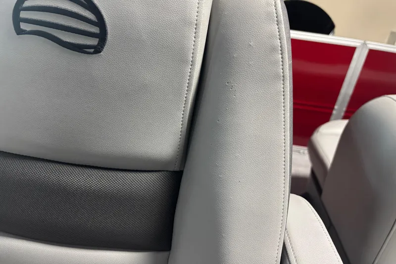 Slide: The Image of 2026 Sun Tracker Party Barge 18 DLX, close-up of luxurious seating detail. - 10