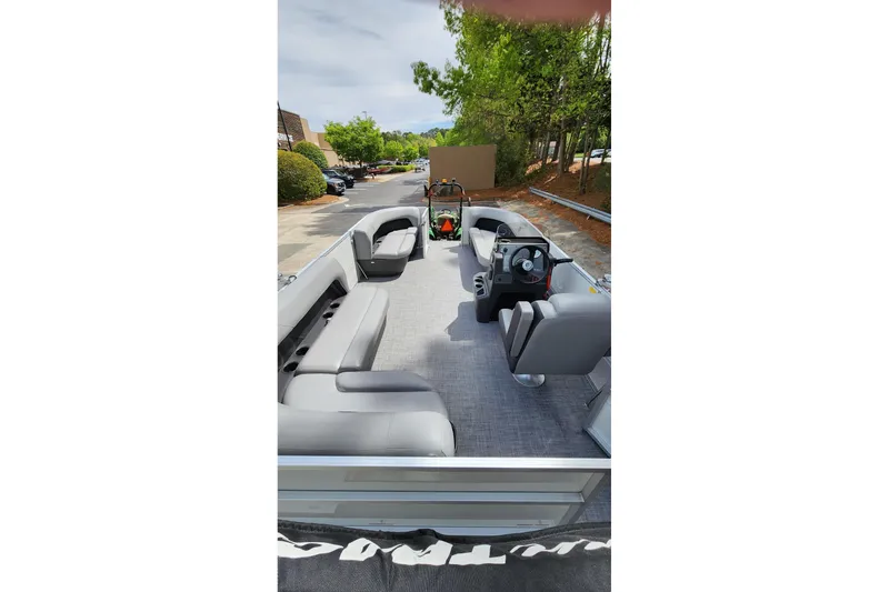 Slide: The Image of 2026 Sun Tracker Party Barge 16 DLX pontoon boat with spacious seating and modern design. - 6