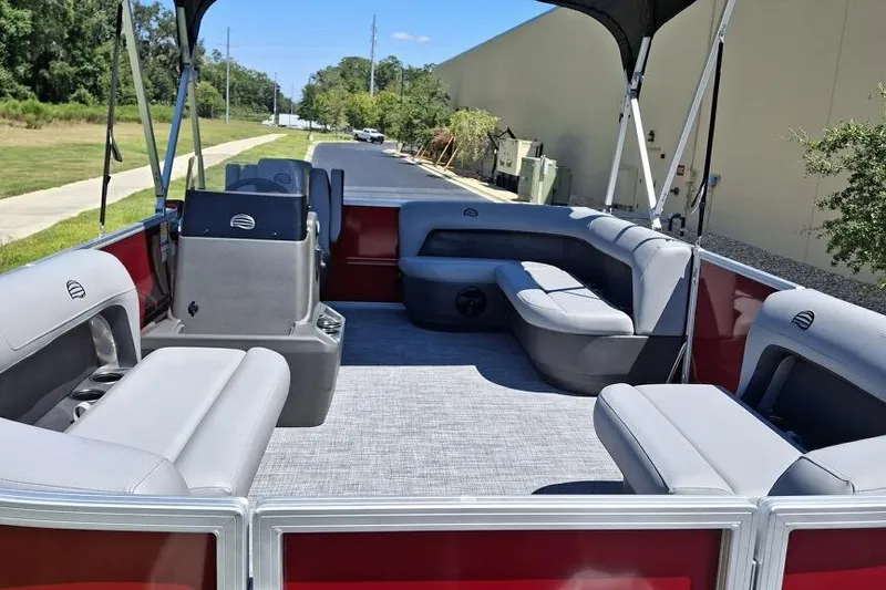 Slide: The Image of 2026 Sun Tracker Party Barge 16 DLX with spacious seating and modern design. - 2