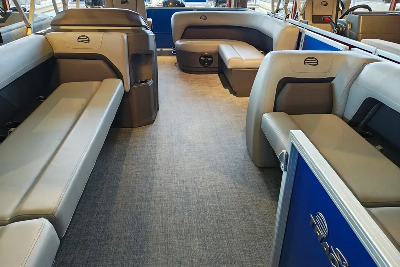 Slide: The Image of 2026 Sun Tracker Party Barge 18 DLX interior with spacious seating and modern design. - 16