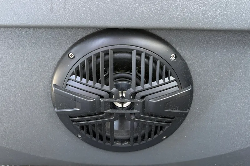 Slide: The Image of Close-up of a speaker on a 2026 Sun Tracker Party Barge 20 DLX. - 35