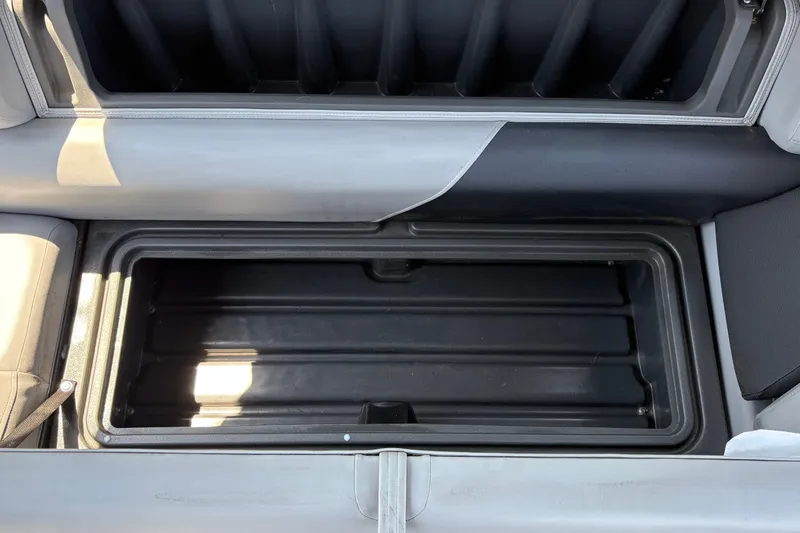 Slide: The Image of Storage compartment of 2026 Sun Tracker Party Barge 20 DLX pontoon boat. - 29