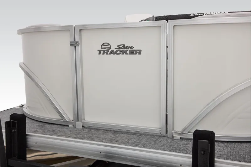 Slide: The Image of 2026 Sun Tracker Party Barge 16 DLX interior with canopy, showcasing seating and helm. - 6